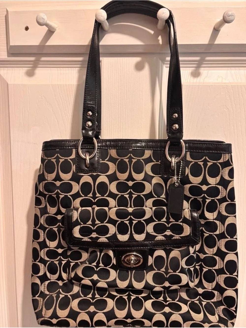 Coach Black and Beige Signature Tote with Front Turn-Lock Pocket